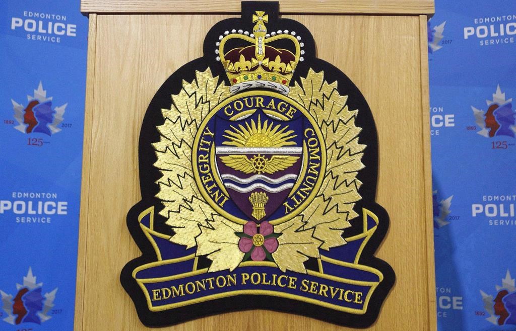 An Edmonton Police Service logo is shown at a press conference in Edmonton, October 2, 2017. THE CANADIAN PRESS/Jason Franson.