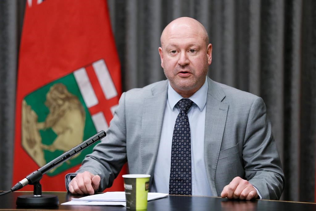 Dr. Brent Roussin, Manitoba chief public health officer, speaks during the province's latest COVID-19 update at the Manitoba legislature in Winnipeg Tuesday, March 31, 2020. THE CANADIAN PRESS/John Woods.