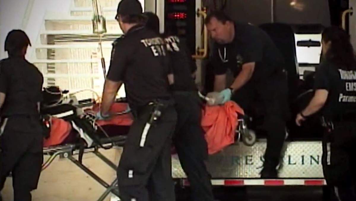 Jordan Manners on a stretcher.