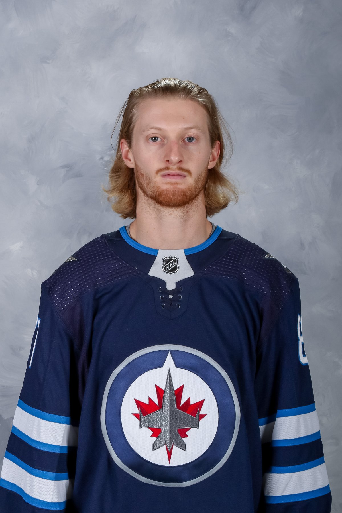 Kyle Connor of the Winnipeg Jets poses for his official headshot for the 2019-2020 season at the Bell MTS Place on Oct. 10, 2019 in Winnipeg, Man. 