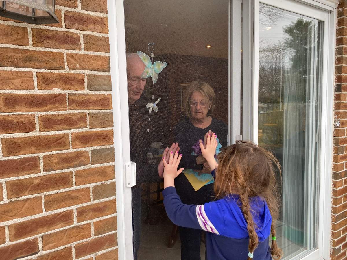 A granddaughter visiting her grandparents.
