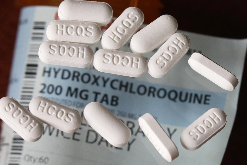 An arrangement of hydroxychloroquine pills. (AP Photo/John Locher)
.