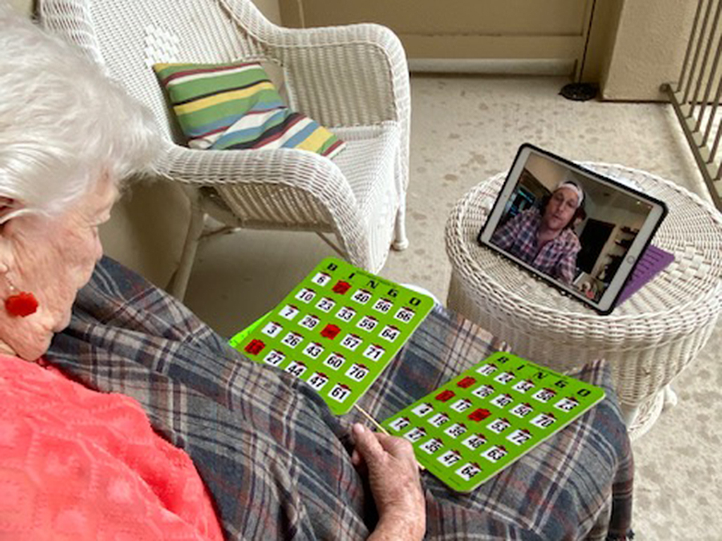 Matthew McConaughey and his family playing bingo, via Zoom, with a resident of the Enclave at Round Rock senior living residency in Round Rock, Texas, in the midst of the COVID-19 pandemic on April 5, 2020.