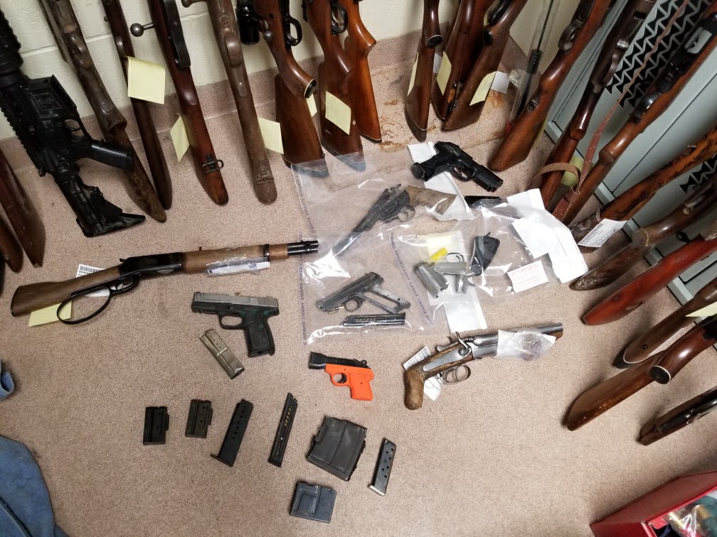 Police say more than 30 firearms were seized in a raid at a home near Melita, Man. April 18.