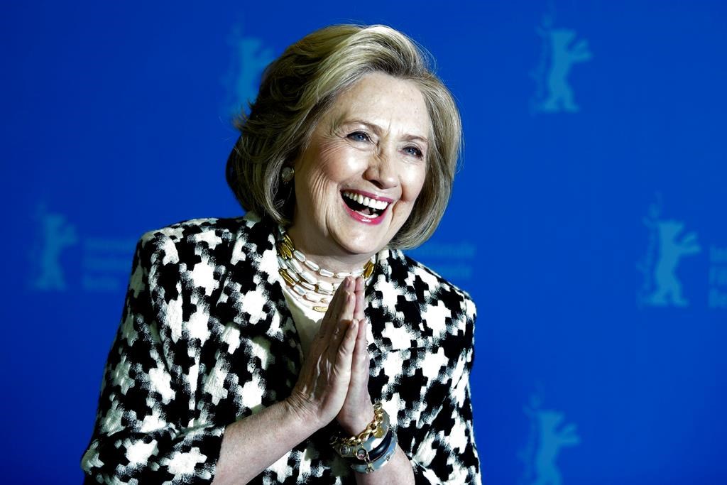 In this Feb. 2020 photo, Former US Secretary of State, Hillary Clinton, poses for the photographers during a photo-call for the film 'Hillary' ' during the 70th International Film Festival Berlin, Berlinale in Berlin, Germany.