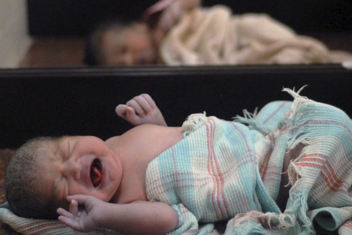 Newborn babies are shown at a hospital maternity ward in India, in this file photo from July 10, 2009.