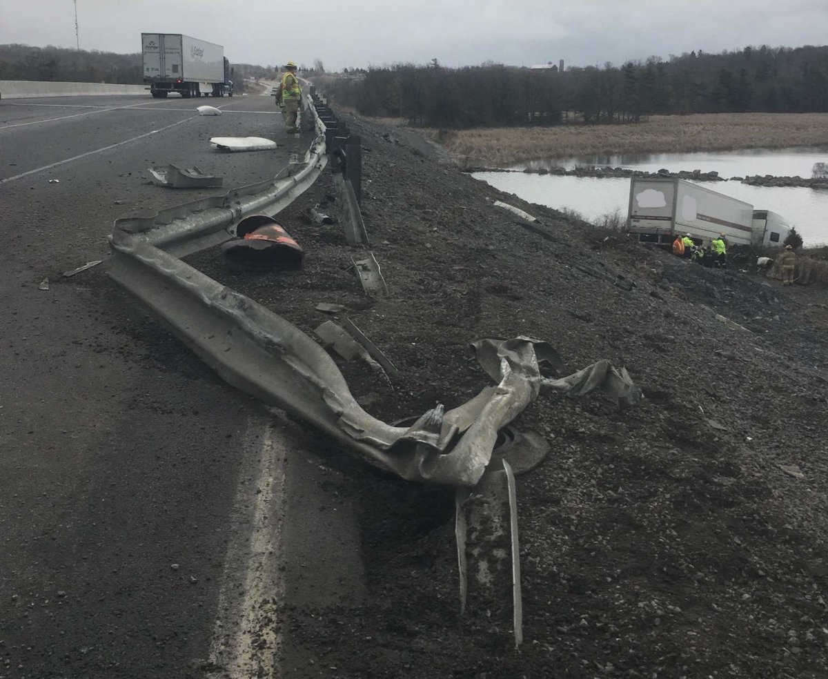 A transport truck left Highway 401 and landed in the Cataraqui River on Friday afternoon.