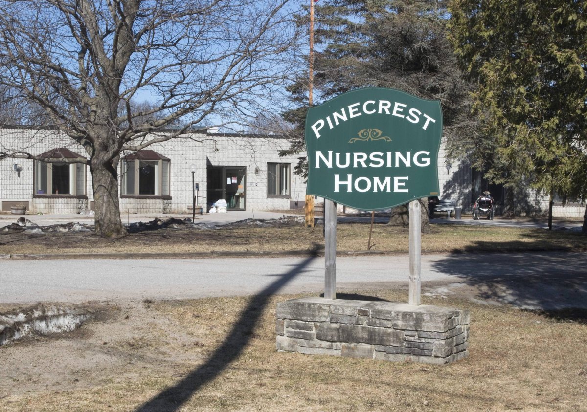 A sign outside of Pinecrest Nursing Home in Bobcaygeon Ont. is seen on Friday, March 27. Since an outbreak, 29 residents have died of COVID-19 complications.