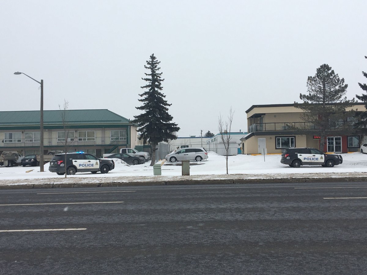 Edmonton police on scene at a south side motel, Sunday, April 5, 2020. 