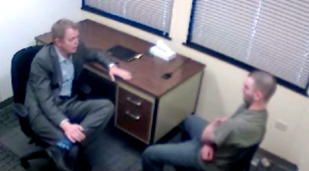 Police interrogate Derek Saretzky.