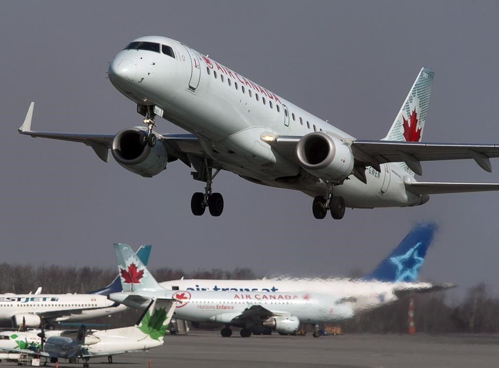 An Air Canada jet takes off from Halifax Stanfield International Airport in Enfield, N.S. on Thursday, March 8, 2012. Air Canada, which has cut roughly half its Canadian workforce, says it will apply for Ottawa's emergency wage subsidy program and retain or return affected employees to its payroll for the program term.THE CANADIAN PRESS/Andrew Vaughan.