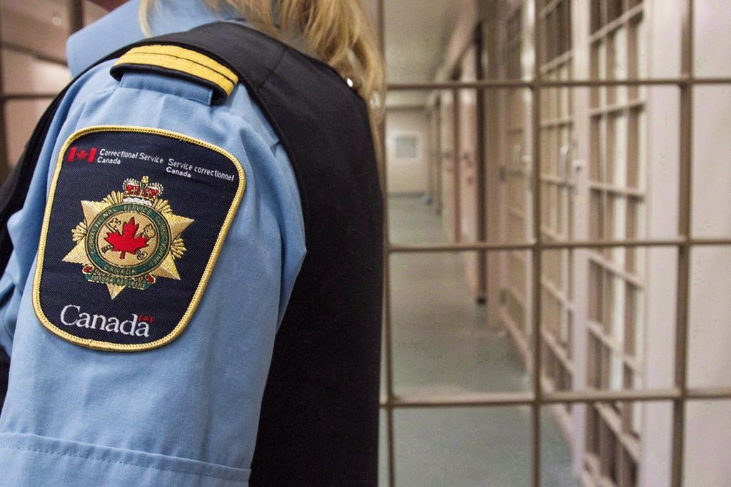 A correctional officer looks on at the Collins Bay Institution in Kingston, Ont., on Tuesday, May 10, 2016, during a tour of the facility. Efforts to contain the rapid spread of COVID-19 in Canada's federal prisons have led to an increase in tensions that have prompted correctional officers to use force on at least two occasions in recent days, according to a prominent prisoner rights group.