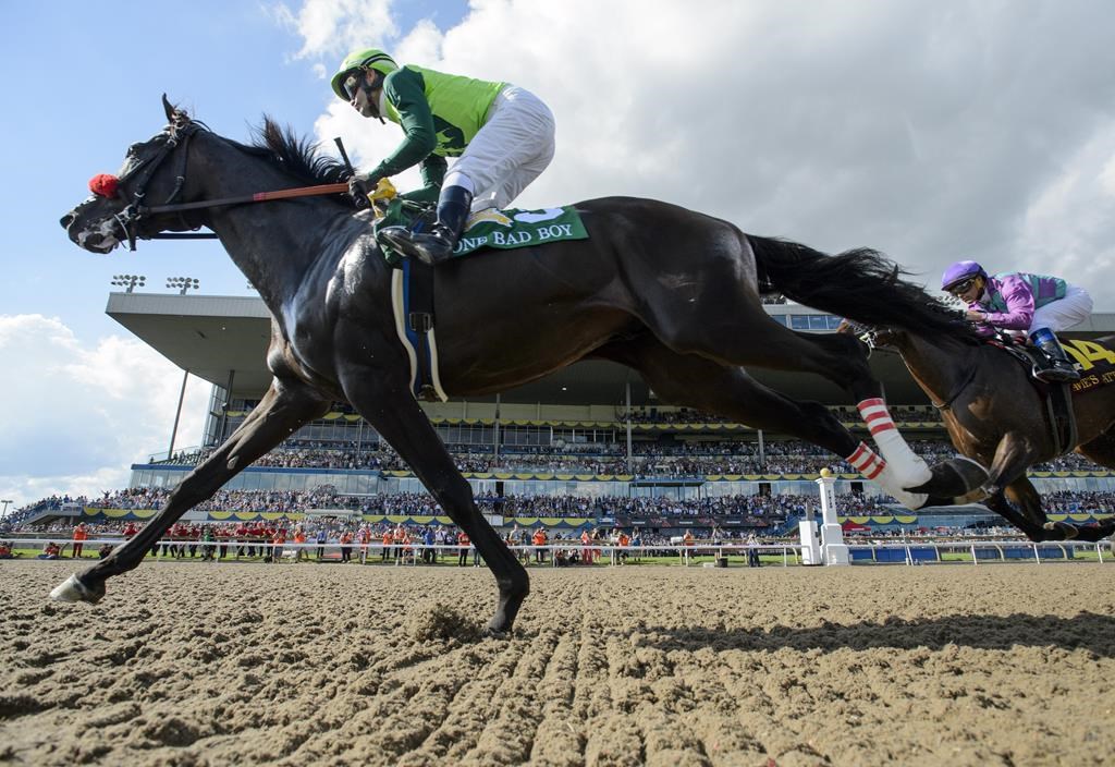 One Bad Boy, ridden by jockey Flavien Prat, wins the 160th running of the Queen's Plate in Toronto on Saturday, June 29, 2019. Woodbine Entertainment will postpone the 2020 Queen's Plate indefinitely due to the COVID-19 pandemic, a source has told The Canadian Press.