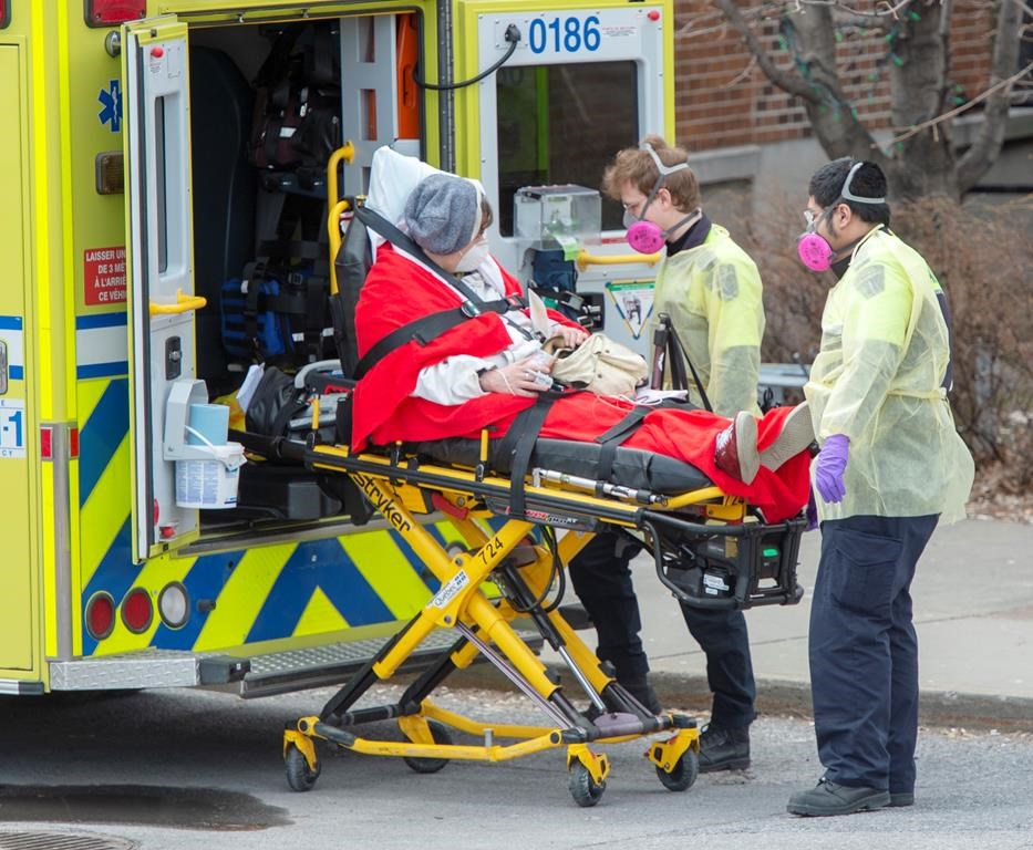Paramedics transfer a patient to the emergency unit at Verdun Hospital, Tuesday, April 14, 2020 in Montreal.