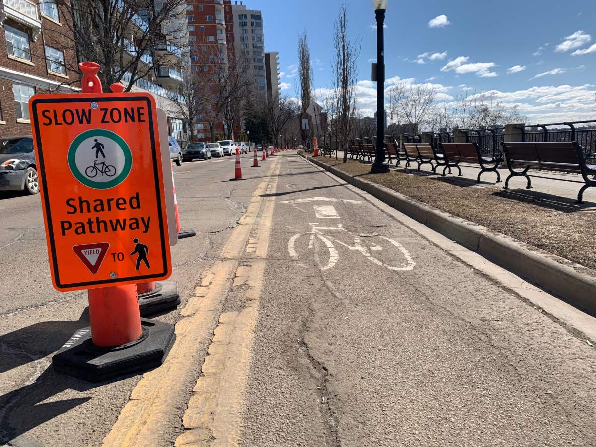 Some roadways and bike paths in Edmonton have been adjusted to promote social distancing through COVID-19. 