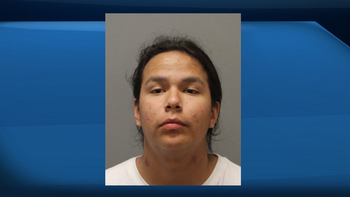 RCMP are looking for Travis Roasting in connection with a shooting in January.