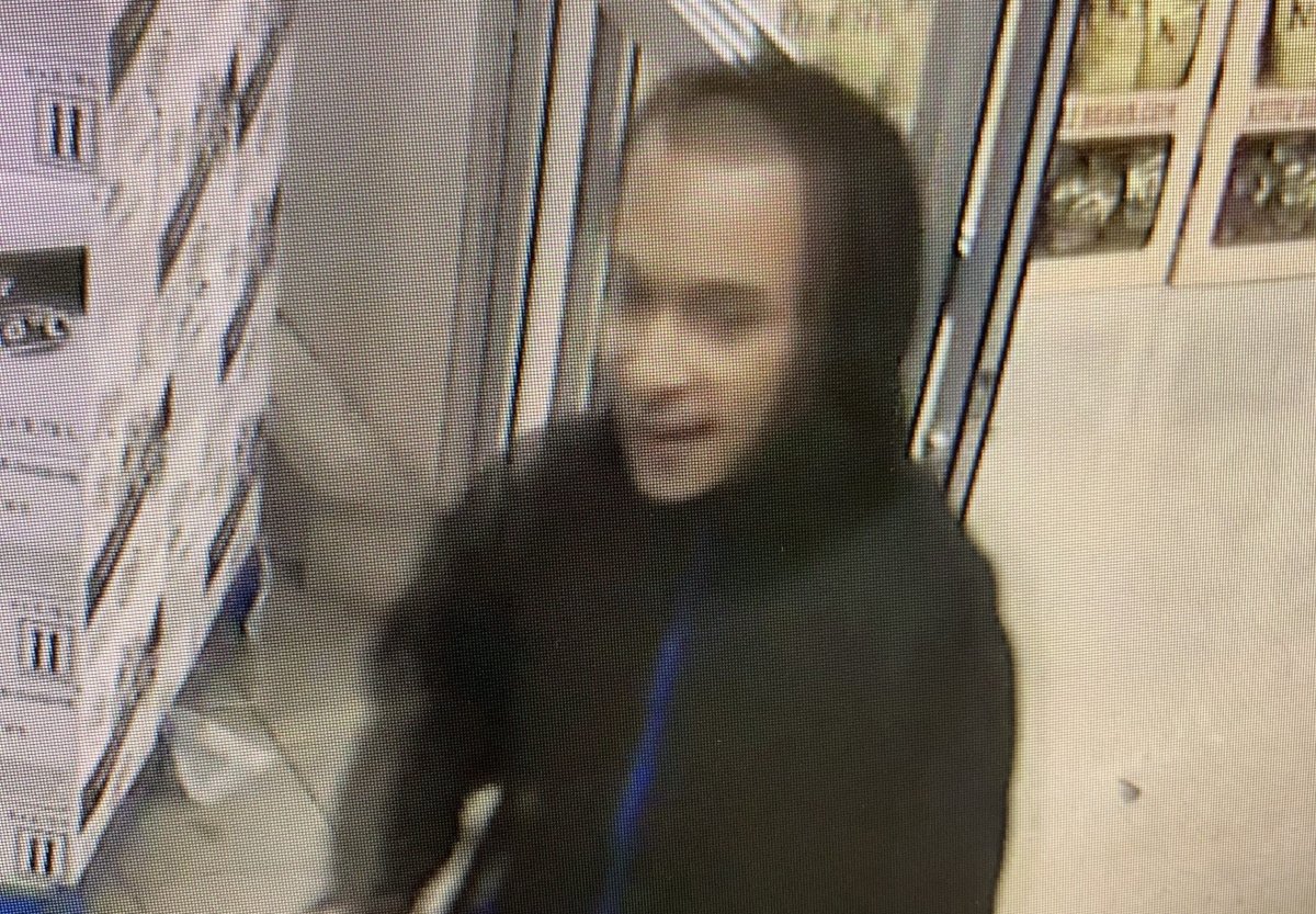 Guelph police released a photo of a man after a grocery store clerk was spat on. 