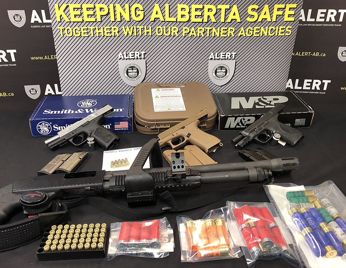 Grande Prairie man facing 31 charges after restricted handguns allegedly sold to criminals - image