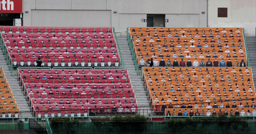 Spectators’ seats are covered with pictures of fans before the start of a regular season baseball game between Hanwha Eagles and SK Wyverns in Incheon, South Korea, Tuesday, May 5, 2020. South Korea’s professional baseball league start its new season on May 5, initially without fans, following a postponement over the coronavirus.