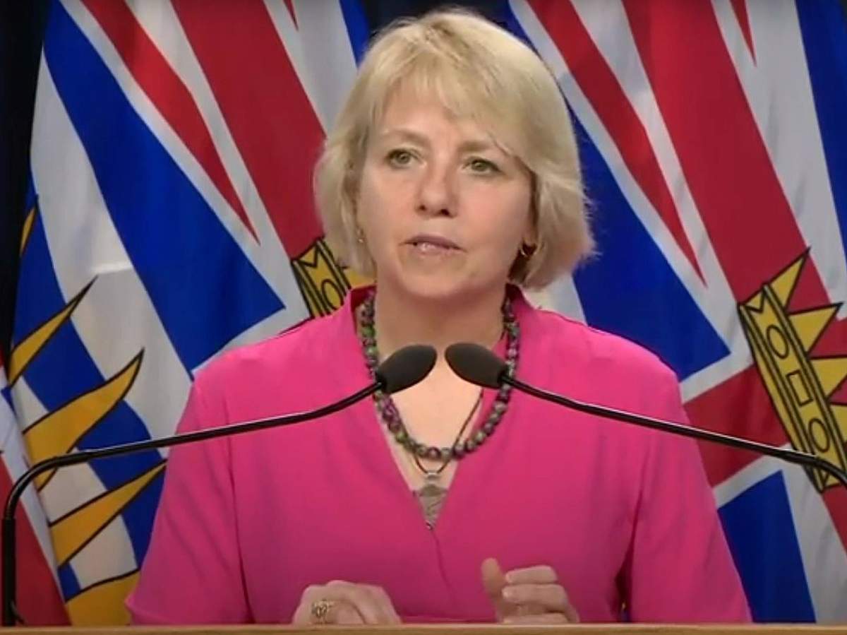 Provincial health officer Dr. Bonnie Henry looks on while answering a question during her daily announcement of coronavirus statistics in B.C., on Saturday, May 23, 2020.