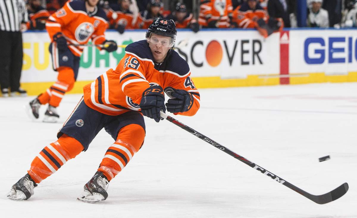 Edmonton Oilers' Tyler Benson (49) plays his first NHL game during second period NHL action against the San Jose Sharks, in Edmonton, Thursday, Feb. 6, 2020. THE CANADIAN PRESS/Jason Franson.