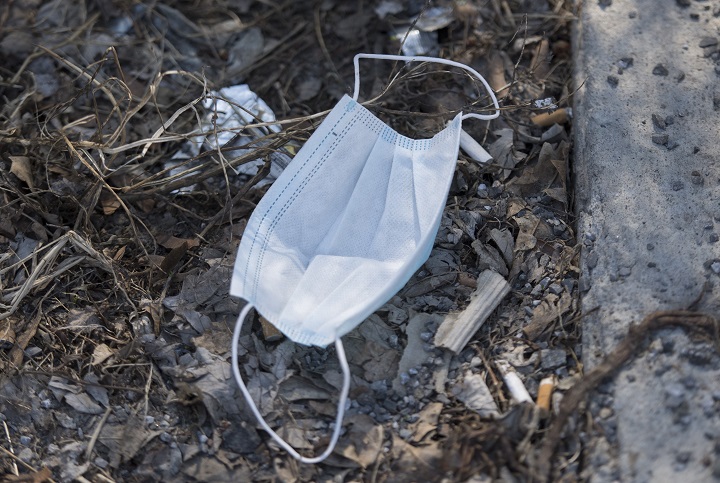 A discarded face mask is shown on a street in Montreal, Saturday, April 25, 2020, as COVID-19 cases rise in Canada and around the world. At least four health-care workers have diedin Quebec of COVID-related complications.