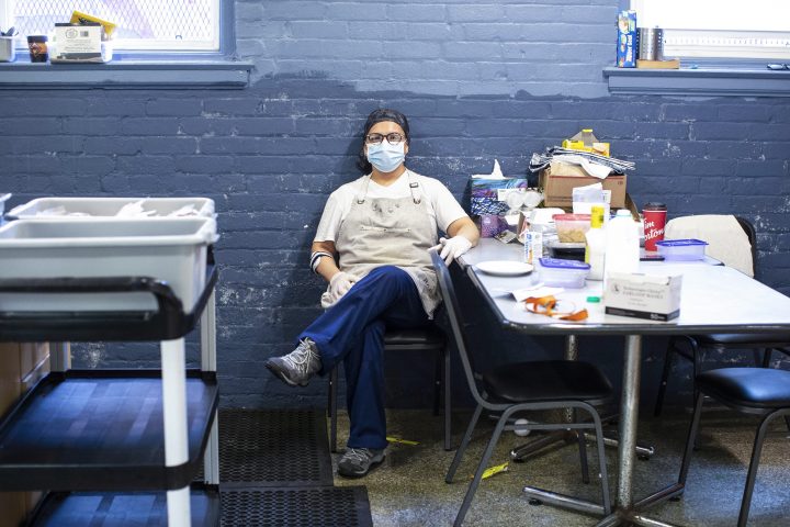 Ana Macias, a migrant from Mexico is photographed as she volunteers in the kitchen of The Shelter, a respite centre in Toronto swerving the homeless, on Sunday, April 19, 2020. 