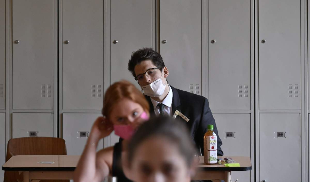 Students wearing face masks are seen in this file photo. 