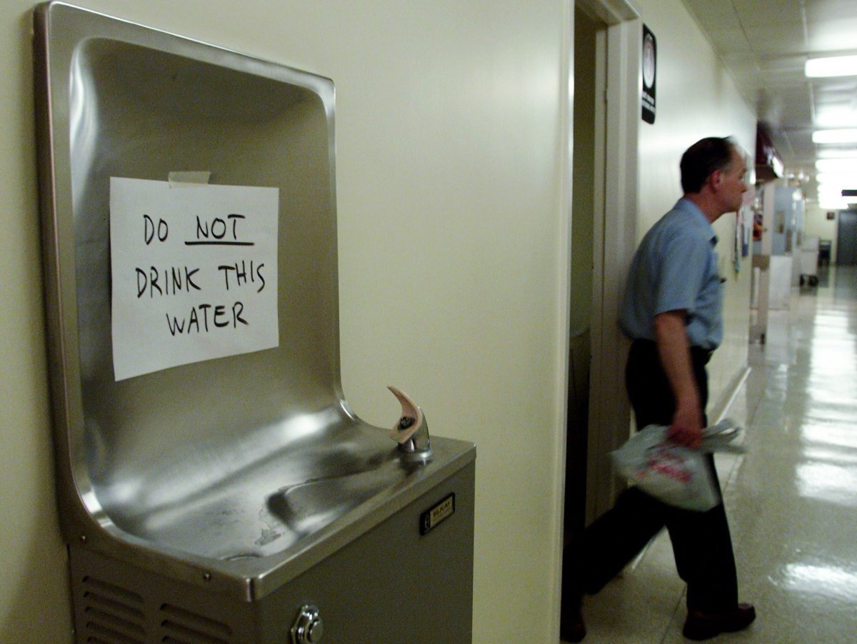 A sign warns people not to drink the water on a fountain at the hospital in Walkerton, Ont. Wednesday May 24, 2000. As the May long weekend approached 20 years ago, an invisible killer began stalking the unsuspecting town of Walkerton, Ont., preparing to unleash an epidemic that would damage or destroy many lives. 