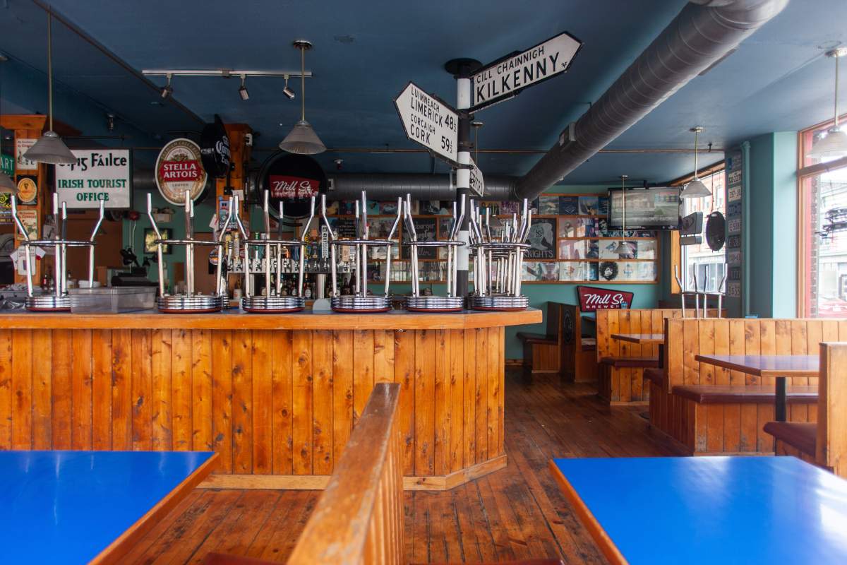 Bar stools sit stacked inside J. Dee's Market Grill in London, Ont., on May 19, 2020 -- one of many businesses closed due to the COVID-19 pandemic.