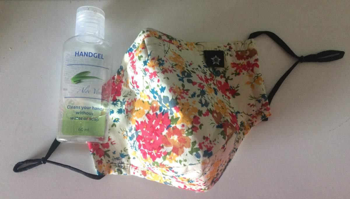 Hand sanitizer and a face mask.