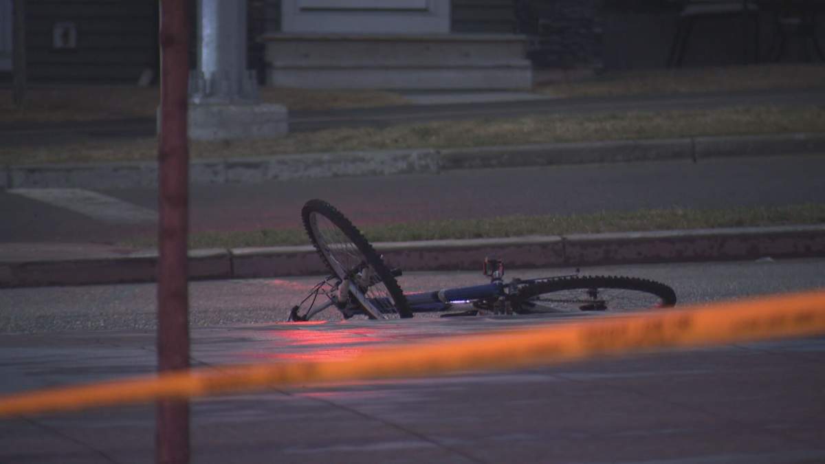 A cyclist was rushed to hospital Thursday night after a collision with a vehicle in Calgary's northwest.