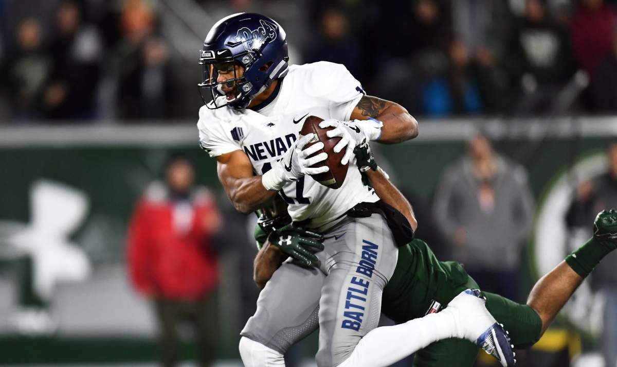Oct 14, 2017; Fort Collins, CO, USA; Nevada Wolf Pack wide receiver Brendan O’Leary-Orange (17) pulls in a reception for a touchdown at Sonny Lubrick Field at Colorado State Stadium. Ron Chenoy-USA TODAY Sports