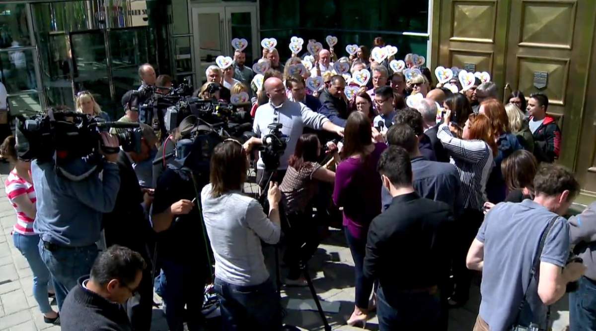Brentwood Five families outside Calgary courthouse.