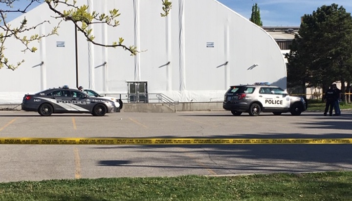 Toronto police block off a scene behind Ted Reeve Community Arena.