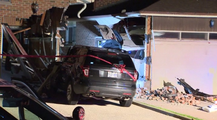 A vehicle crashed into two houses in Markham Thursday evening.