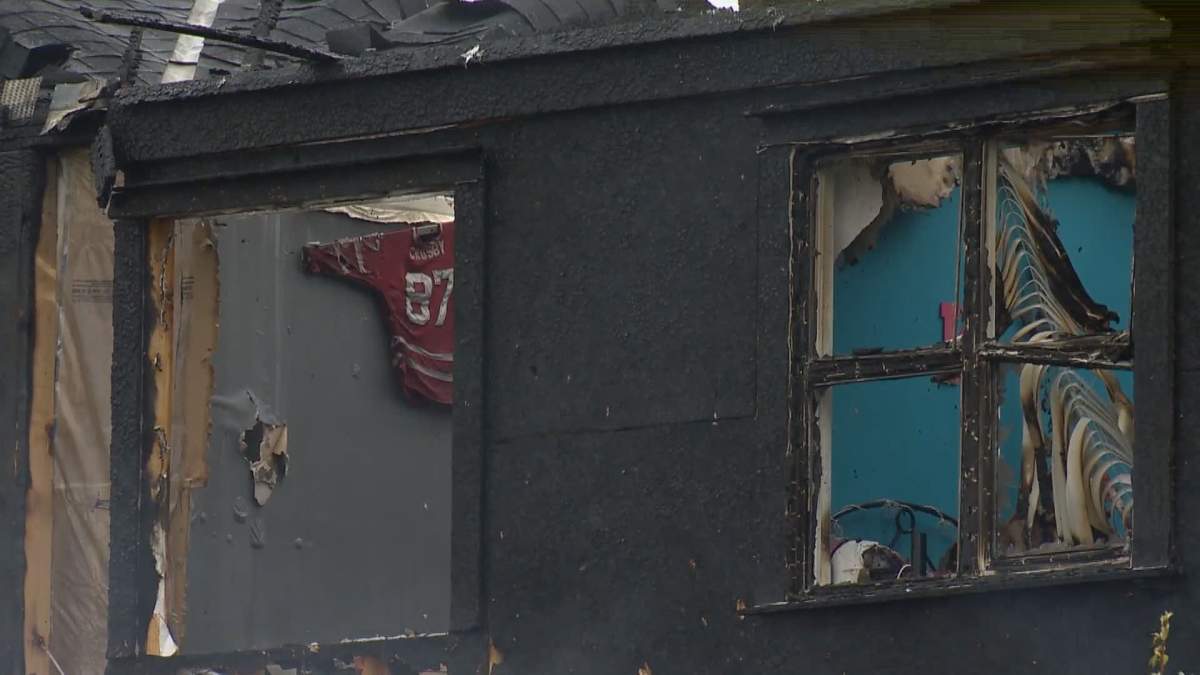 Fire damaged homes in southeast Calgary on Sunday, May 3, 2020.