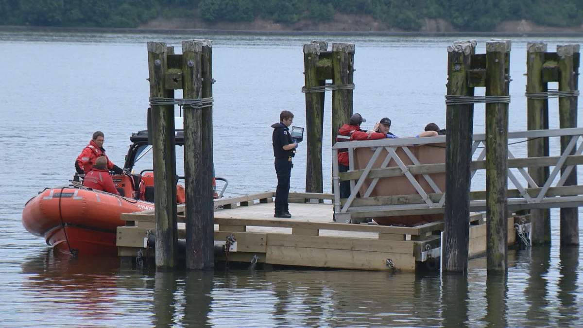 Police and the coroner remain on scene in West Vancouver Monday.