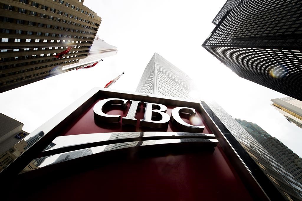 A CIBC sign is shown in the financial district in Toronto on August 22, 2017. THE CANADIAN PRESS/Nathan Denette.