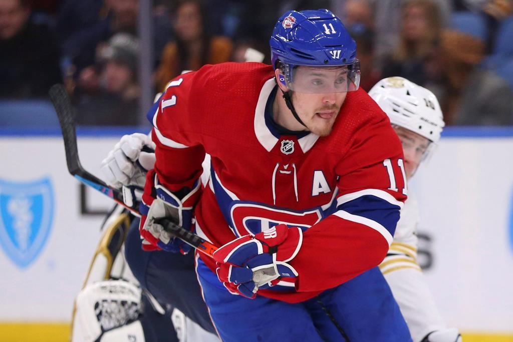In this file photo, Montreal Canadiens forward Brendan Gallagher (11) skates during the second period of an NHL hockey game against the Buffalo Sabres. The Habs announced they've signed Gallagher to a six-year contract extension. Wednesday, Oct. 14, 2020.