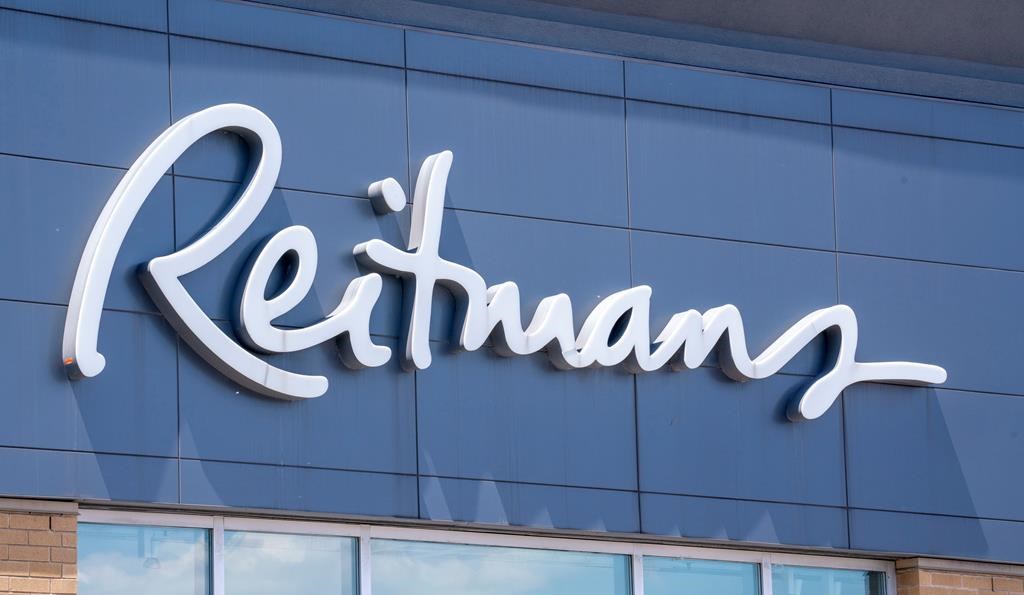 A Reitmans sign is seen on a store front in Montreal on Tuesday, June 18, 2019. Reitmans (Canada) Ltd.