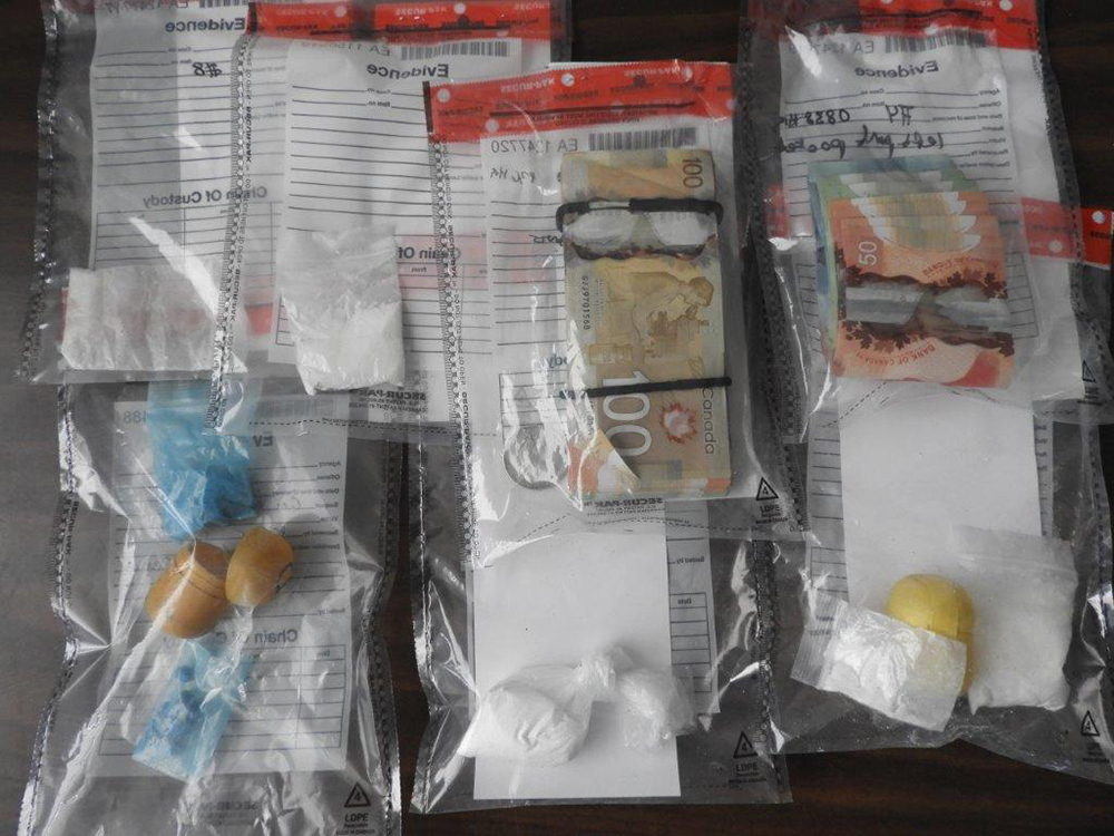 Two people have been arrested after police in Peterborough raided a home and seized fentanyl and cocaine.