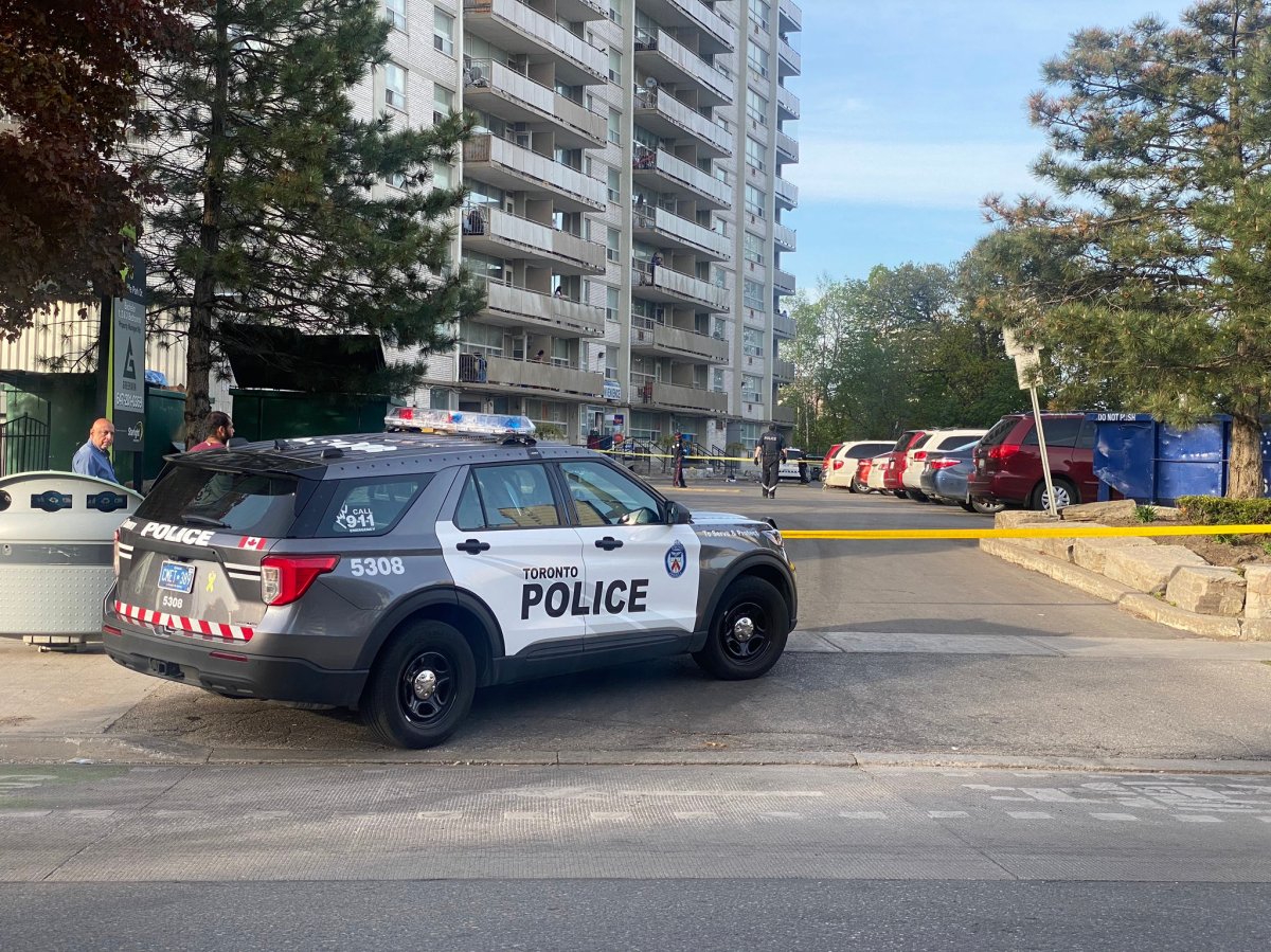 Police at the scene of a shooting in the area of Thorncliffe Park Drive and Overlea Boulevard on Saturday.