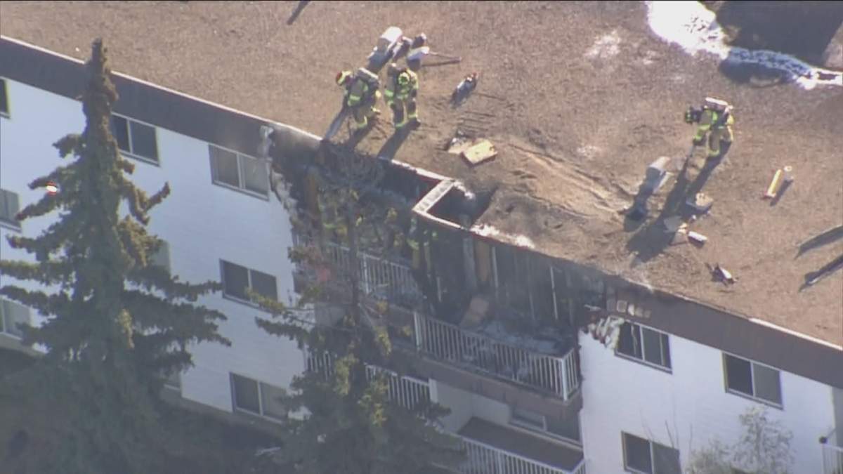 Crews on scene following a north Edmonton apartment fire on Wednesday, May 13, 2020.