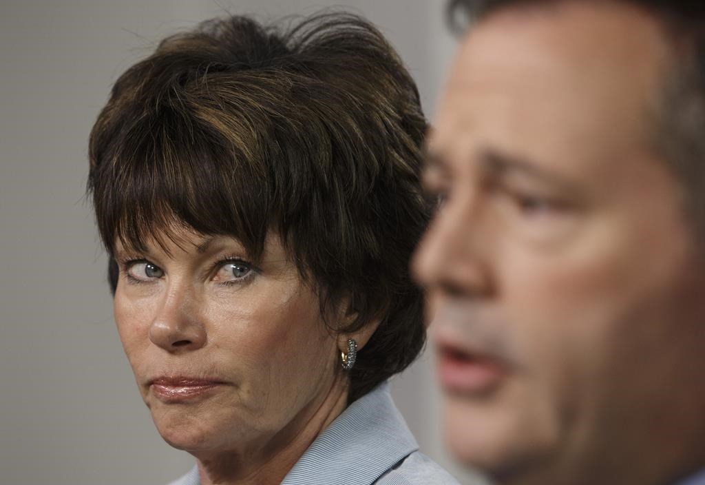 Minister of Energy Sonya Savage looks to Alberta Premier Jason Kenney during a press conference in Edmonton, Wednesday, May 1, 2019.