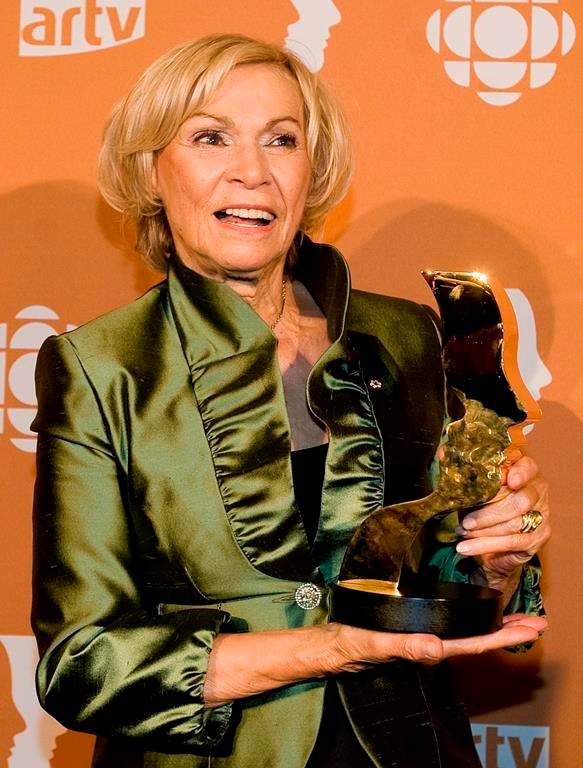 Monique Mercure holds up her award for best female actor in an ongoing tv show, 'Providence', at the annual Les Prix Gemeaux awards, celebrating the best of French Canadian television in Montreal, Sunday, Sept., 20, 2009.