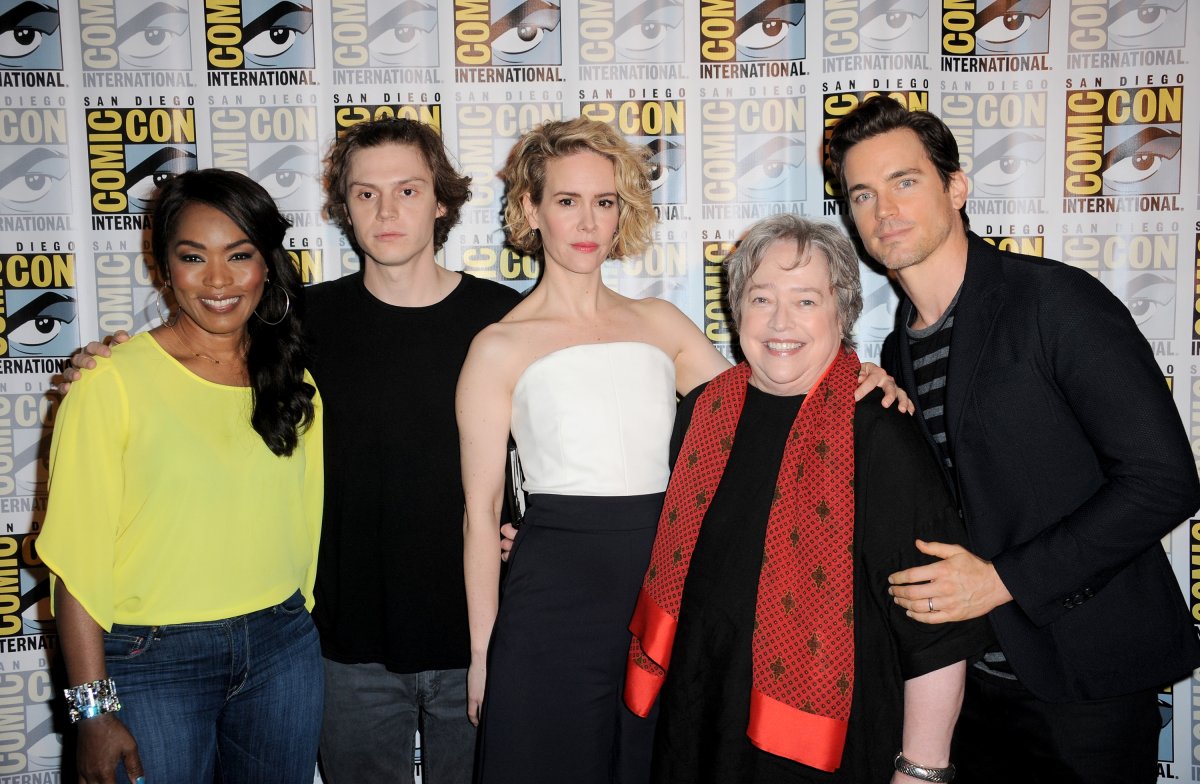 (L-R) Actors Angela Bassett, Evan Peters, Sarah Paulson, Kathy Bates, and Matt Bomer pose at the 'American Horror Story' and 'Scream Queens' panel during Comic-Con International 2015 at the San Diego Convention Center on July 12, 2015 in San Diego, California.  