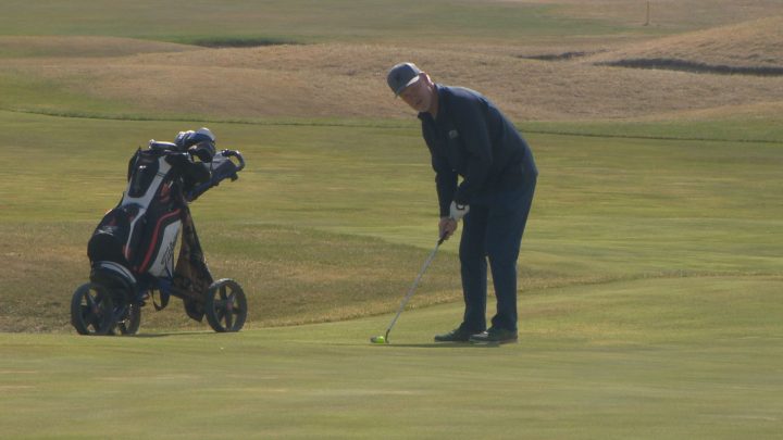 Al Stickney lines up a putt at Moon Lake Golf and Country Club as courses across Saskatchewan opened in the wake of COVID-19.