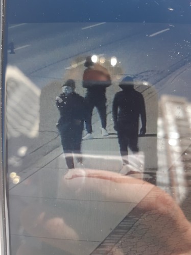 Calgary police are looking to identify three suspects involved in a possibly hate-motivated graffiti attack on the Chinese Consular-General building.