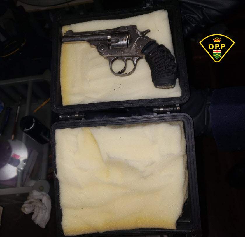 OPP say they seized a loaded handgun and drugs from a Napanee, Ont., apartment Thursday.